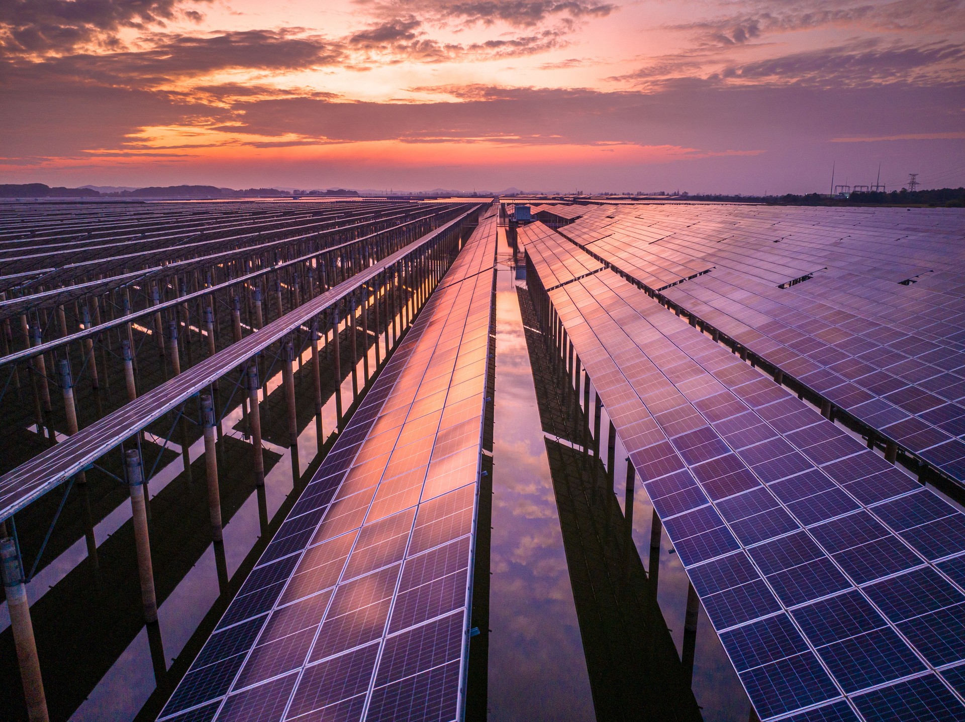 Aerial solar photovoltaic panel after aerial sunset